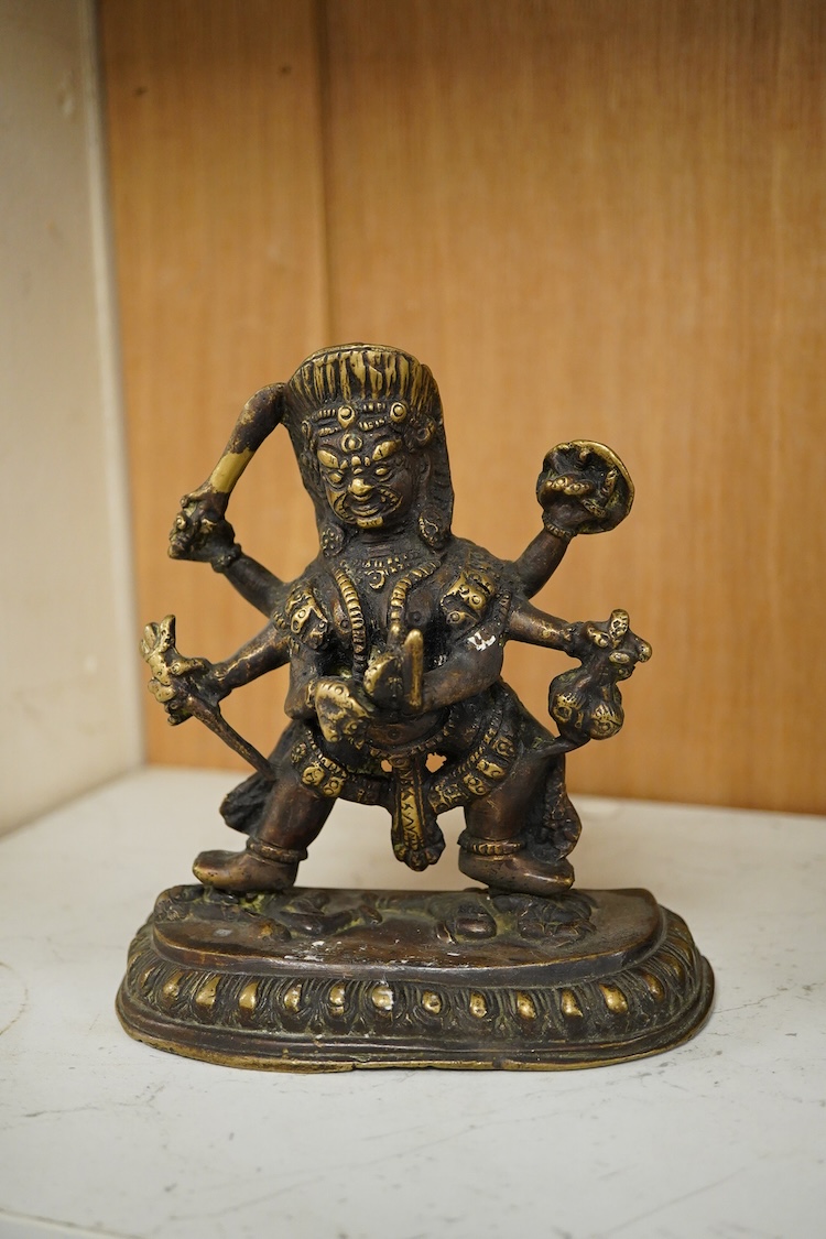 Three South East Asian brass figures to include one of Bodhisattva, largest 28cm high